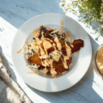 ground beef in a bowl with bacon cheese and sauce