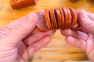cutting kielbasa bites hasselback style